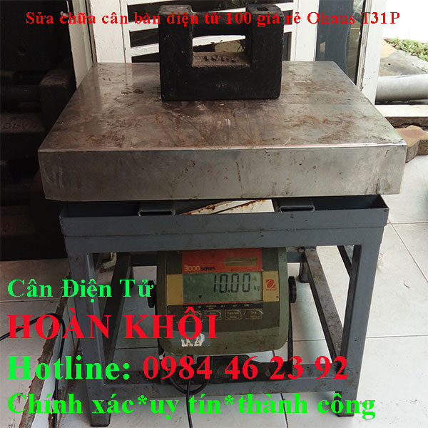 sua-chua-can-ban-dien-tu-100kg-gia-re-tan-noi-ohaus-t31p